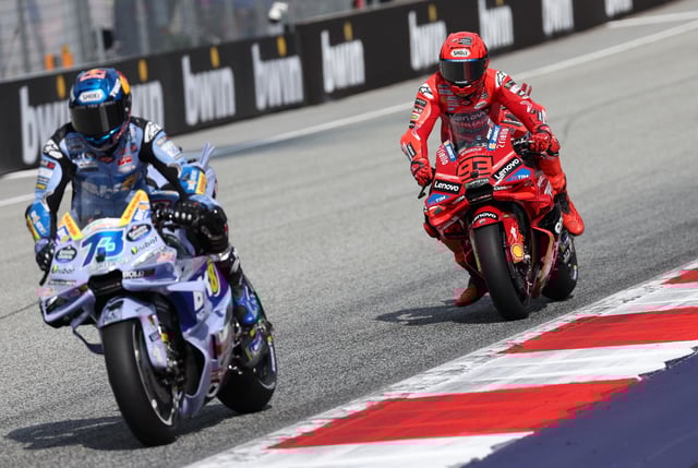 MotoGP - Austrian Grand Prix - Red Bull Ring, Spielberg, Austria - August 16, 2025 BK8 Gresini Racing MotoGP's Alex Marquez and Ducati Lenovo Team's Marc Marquez in action during qualifying REUTERS/Gintare Karpaviciute