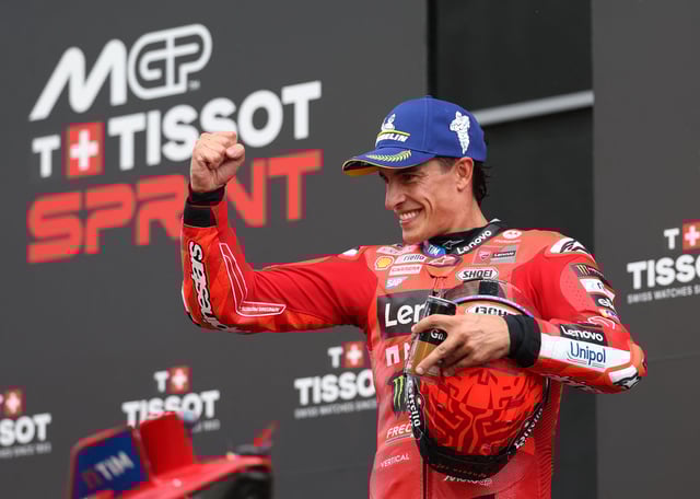 MotoGP - Austrian Grand Prix - Red Bull Ring, Spielberg, Austria - August 16, 2025 Ducati Lenovo Team's Marc Marquez celebrates after winning the sprint race REUTERS/Gintare Karpaviciute