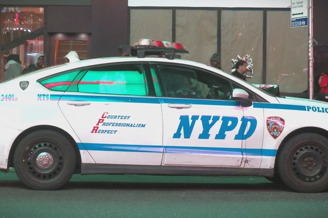 A police cruiser on a New York City street.