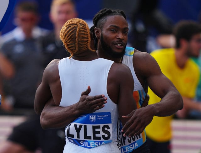 Athletics - Diamond League - Silesia - Silesian Stadium, Chorzow, Poland - August 16, 2025 Jamaica's Kishane Thompson celebrates after winning the Men's 100m Final with second placed Noah Lyles of the U.S. REUTERS/Aleksandra Szmigiel