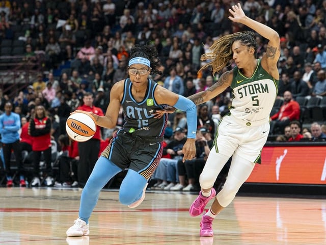  Gabby Williams #5 of the Seattle Storm tries to guard Allisha Gray #15 of the Atlanta Dream during the first half of WNBA action at Rogers Arena.