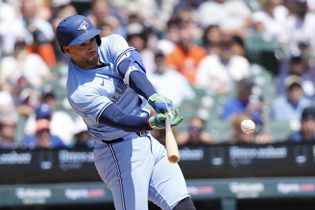 Jul 27, 2025; Detroit, Michigan, USA;  Toronto Blue Jays outfielder George Springer (4) hits a single in the third inning against the Detroit Tigers at Comerica Park. Mandatory Credit: Rick Osentoski-Imagn Images/File Photo