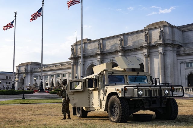 US National Guard members patrol Union Station in Washington DC on August 15.