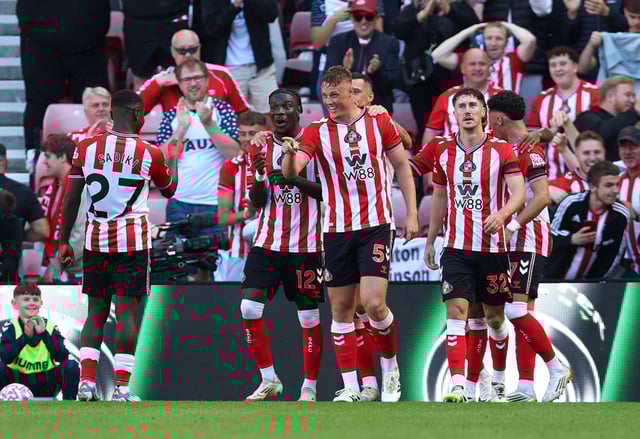 Soccer Football - Premier League - Sunderland v West Ham United - Stadium of Light, Sunderland, Britain - August 16, 2025 Sunderland's Daniel Ballard celebrates scoring their second goal with teammates Action Images via Reuters/Craig Brough