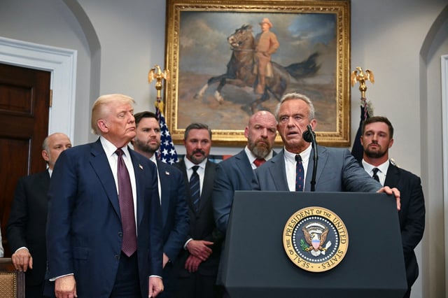 US President Donald Trump (2L) listens as US Secretary of Health and Human Services Robert F. Kennedy Jr. speaks prior to signing an executive order restarting the Presidential Fitness Test in public schools in the Roosevelt Room of the White House in Washington, DC, on July 31, 2025. (Photo by Jim WATSON / AFP) (Photo by JIM WATSON/AFP via Getty Images)