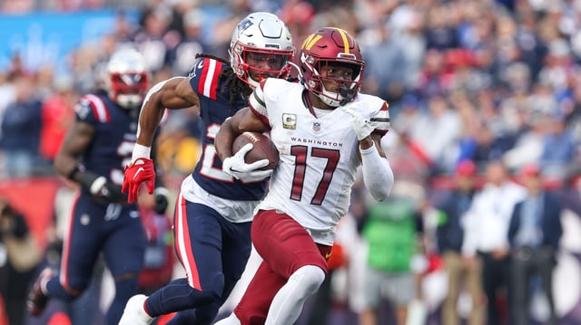 Nov 5, 2023; Foxborough, Massachusetts, USA; Washington Commanders receiver Terry McLaurin (17) runs the ball during the second half against the New England Patriots at Gillette Stadium. 