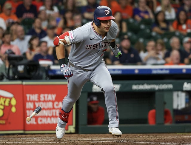 Jul 28, 2025; Houston, Texas, USA; Washington Nationals first baseman Nathaniel Lowe (33) hits a RBI double against the Houston Astros in the sixth inning at Daikin Park. Mandatory Credit: Thomas Shea-Imagn Images/File photo