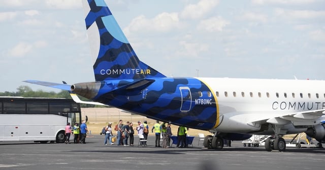 Texas Democratic legislators board a plane as they head to Illinois on August 3, 2025.
