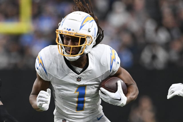 Quentin Johnston #1 of the Los Angeles Chargers runs the ball against the Las Vegas Raiders in the second quarter of their game at Allegiant Stadium on January 05, 2025 in Las Vegas, Nevada. The Chargers defeated the Raiders 34-20.
