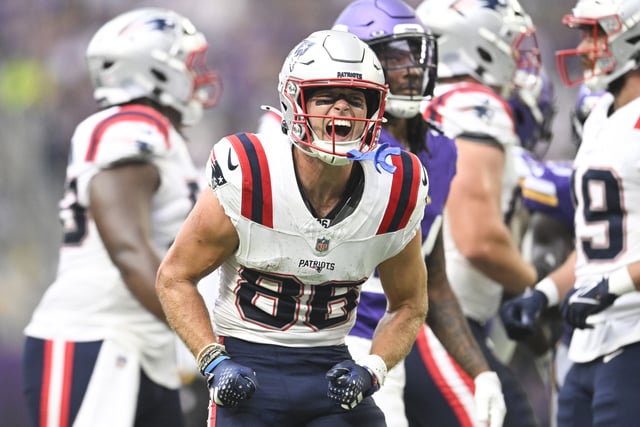 MINNEAPOLIS, MINNESOTA - AUGUST 16: Efton Chism III #86 of the New England Patriots celebrates after a first down reception during the second quarter of the NFL Preseason 2025 game against the Minnesota Vikings at U.S. Bank Stadium on August 16, 2025 in Minneapolis, Minnesota.