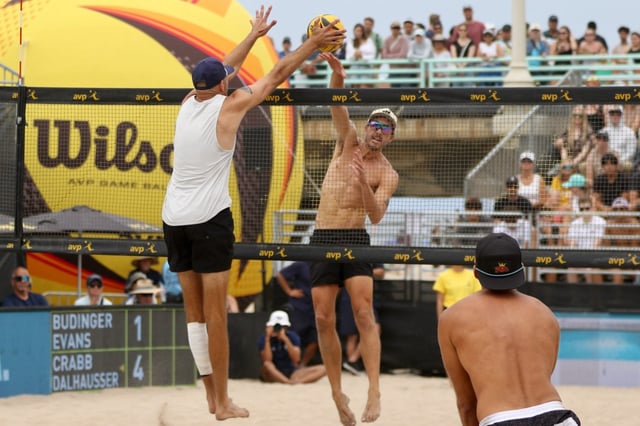 Miles Evans gets a kill over Phil Dalhausser in men’s play at the AVP Manhattan Beach Open on Saturday, Aug. 16, 2025. Evans and Chase Budinger advanced to Sunday’s semi-final action. (Photo by Howard Freshman, Contributing Photographer)