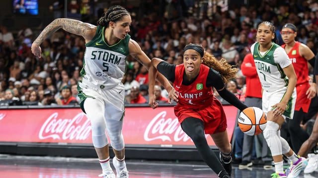 Jul 3, 2025; College Park, Georgia, USA; Atlanta Dream guard Jordin Canada (3) drives the ball towards the goal against Seattle Storm forward Gabby Williams (5) during the fourth quarter at Gateway Center Arena at College Park. Mandatory Credit: Jordan Godfree-Imagn Images