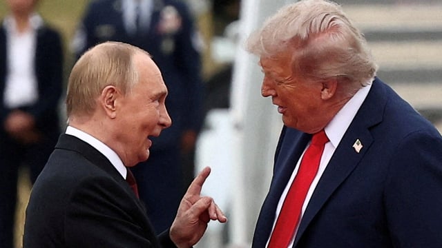 US President Donald Trump shakes hand with Russian President Vladimir Putin, as they meet to negotiate for an end to the war in Ukraine, at Joint Base Elmendorf-Richardson in Anchorage, Alaska, U.S., August 15, 2025.