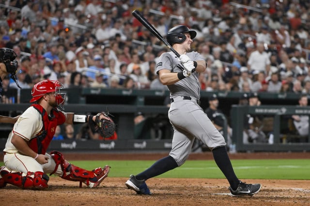 Aug 16, 2025; St. Louis, Missouri, USA;  New York Yankees first baseman Ben Rice (22) hits a three run double against the St. Louis Cardinals during the sixth inning at Busch Stadium. Mandatory Credit: Jeff Curry-Imagn Images