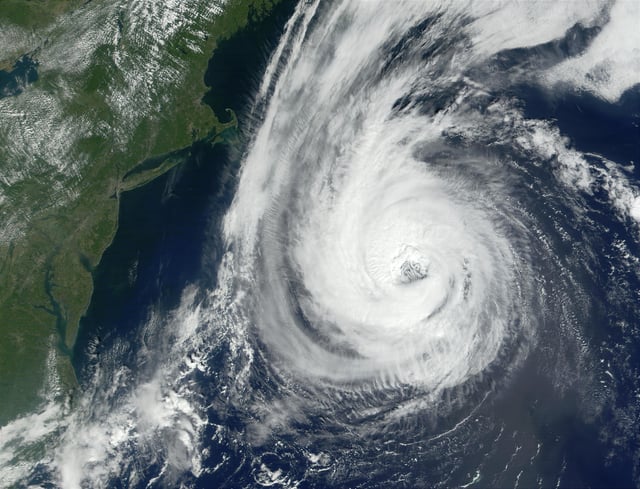 A close look at this NASA satellite image shows smoke drifting from the site of the attacks on the World Trade Center on Sept. 11, 2001 as a previous Hurricane Erin churns along off the U.S. East Coast.