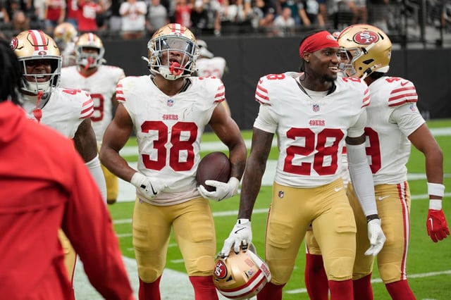 San Francisco 49ers safety Jaylen Mahoney (38) celebrates after intercepting a pass during the second half of a preseason NFL football game against the Las Vegas Raiders, Saturday, Aug. 16, 2025, in Las Vegas. (AP Photo/John Locher)
