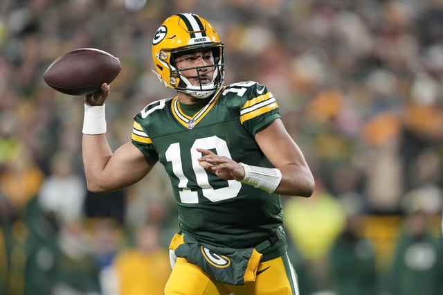 Jordan Love #10 of the Green Bay Packers throws a pass during the first half against the Kansas City Chiefs at Lambeau Field on December 03, 2023 in Green Bay, Wisconsin.
