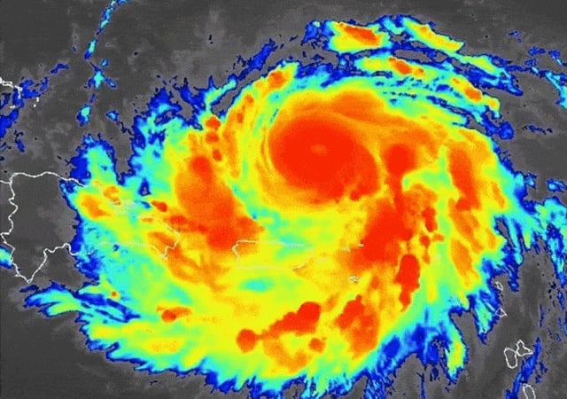 Hurricane Erin is seen Sunday morning just north of Puerto Rico in this NOAA infrared satellite image. (National Hurricane Center)
