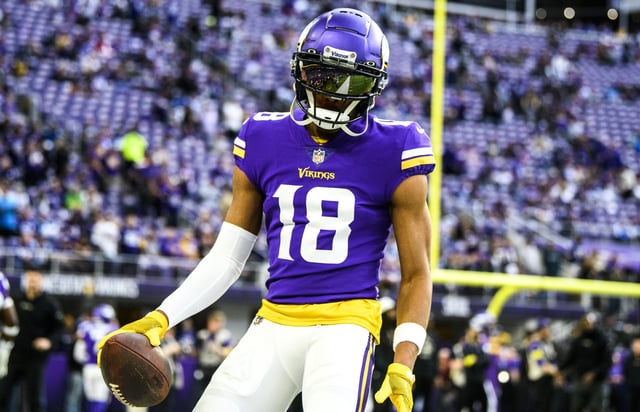 Justin Jefferson #18 of the Minnesota Vikings warms up before the game against the Indianapolis Colts at U.S. Bank Stadium on December 17, 2022 in Minneapolis, Minnesota.