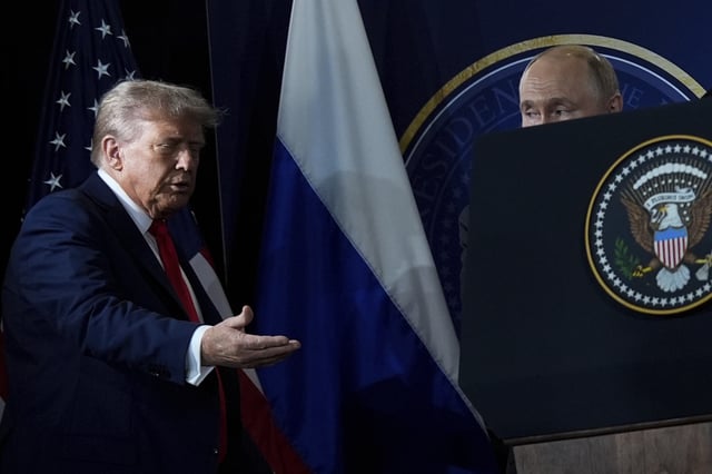 President Donald Trump and Russia&#39;s President Vladimir Putin arrive for a press conference at Joint Base Elmendorf- Richardson, Friday, Aug. 15, 2025, in Anchorage, Alaska.