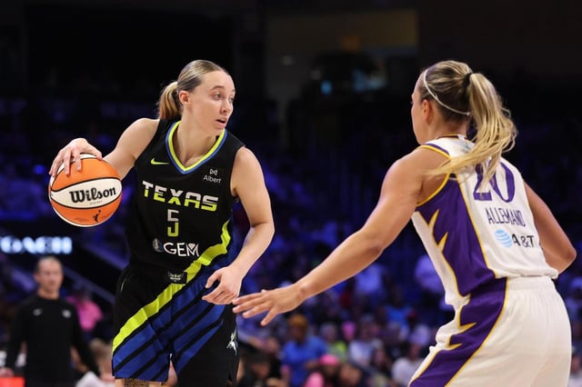 The Dallas Wings’ Paige Bueckers works against the Los Angeles Sparks’ Julie Allemand during the first half at College Park Center on Friday, Aug. 15, 2025, in Arlington, Texas. (Stacy Revere/Getty Images North America/TNS)