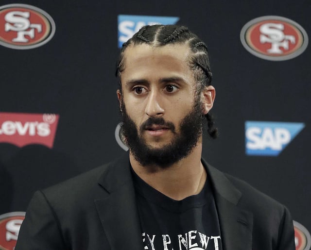 This Jan. 1, 2017, file photo shows then San Francisco 49ers quarterback Colin Kaepernick speaking at a news conference after the team’s NFL football game against the Seattle Seahawks in Santa Clara. ESPN has confirmed it will not move forward with a highly anticipated docuseries about Kaepernick, who ignited a national movement in 2016 by kneeling during the national anthem to protest racial injustice and police brutality.