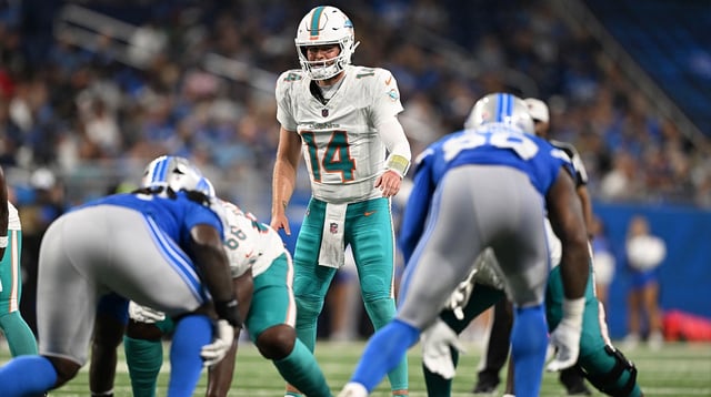 Aug 16, 2025; Detroit, Michigan, USA; Miami Dolphins quarterback Quinn Ewers (14) calls out a play against the Detroit Lions in the fourth quarter at Ford Field. Mandatory Credit: Lon Horwedel-Imagn Images