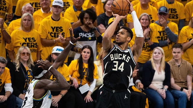 Apr 29, 2025; Indianapolis, Indiana, USA; Milwaukee Bucks forward Giannis Antetokounmpo (34) shoots the ball while Indiana Pacers forward Pascal Siakam (43) defends during game five of the first round for the 2024 NBA Playoffs at Gainbridge Fieldhouse. Mandatory Credit: Trevor Ruszkowski-Imagn Images