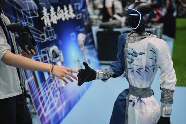 Photos of Beijing’s World Humanoid Robot Games Show How a Human Touch Is Still Needed