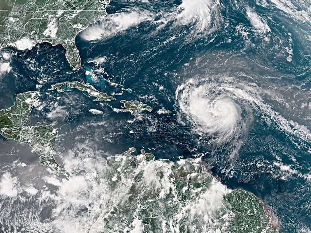 ATLANTIC OCEAN - AUGUST 15: In this NOAA image taken by the GOES satellite, Hurricane Erin crosses the Atlantic Ocean as it moves west on August 15, 2025. According to the National Hurricane Center, Erin has strengthened to a Category 1 storm as the first major hurricane of the 2025 season. (Photo by NOAA via Getty Images)