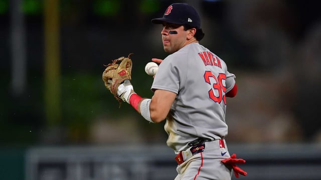 Jun 24, 2025; Anaheim, California, USA; Boston Red Sox second baseman Marcelo Mayer (39) loses control of the ball for the throw to first against Los Angeles Angels center fielder Jo Adell (7). during the seventh inning at Angel Stadium. Mandatory Credit: Gary A. Vasquez-Imagn Images