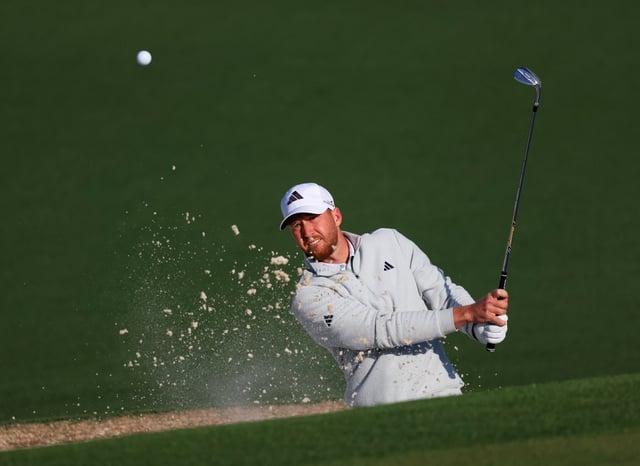 Golf - The Masters - Augusta National Golf Club, Augusta, Georgia, U.S. - April 9, 2025 Daniel Berger of the U.S. plays out from the bunker on the 2nd hole during a practice round REUTERS/Mike Segar/File Photo