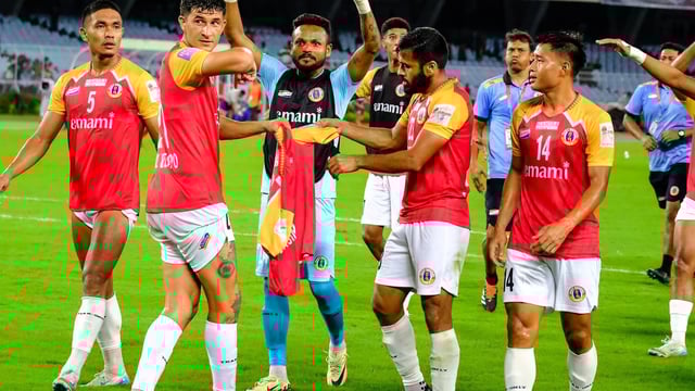 East Bengal players celebrate the win.