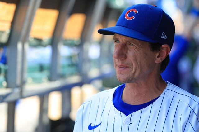 CHICAGO, ILLINOIS - AUGUST 06: Craig Counsell #11 of the Chicago Cubs looks on against the Cincinnati Reds at Wrigley Field on August 06, 2025 in Chicago, Illinois.