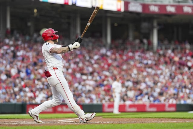 Jul 29, 2025; Cincinnati, Ohio, USA;  Cincinnati Reds outfielder Jake Fraley (27) watches his two-run home run against the Los Angeles Dodgers in the fourth inning at Great American Ball Park. Mandatory Credit: Aaron Doster-Imagn Images/File photo