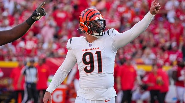 Sep 15, 2024; Kansas City, Missouri, USA; Cincinnati Bengals defensive end Trey Hendrickson (91) celebrates against the Kansas City Chiefs after a play during the game at GEHA Field at Arrowhead Stadium. Mandatory Credit: Denny Medley-Imagn Images