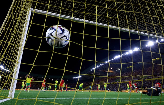 Soccer Football - Ligue 1 - Nantes v Paris St Germain - The Stade de la Beaujoire - Louis Fonteneau, Nantes, France - August 17, 2025 Paris St Germain's Vitinha scores their first goal past Nantes' Anthony Lopes REUTERS/Stephane Mahe