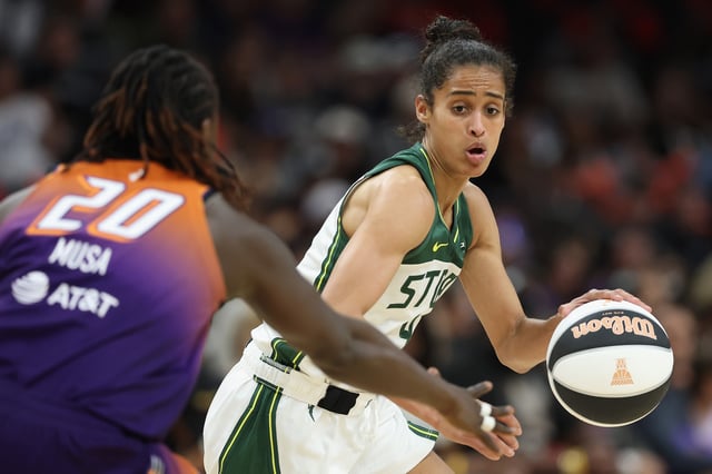 Skylar Diggins #4 of the Seattle Storm handles the ball against Murjanatu Musa #20 of the Phoenix Mercury during the second half of the WNBA game at PHX Arena on June 07, 2025 in Phoenix, Arizona. The Storm defeated the Mercury 89-77.