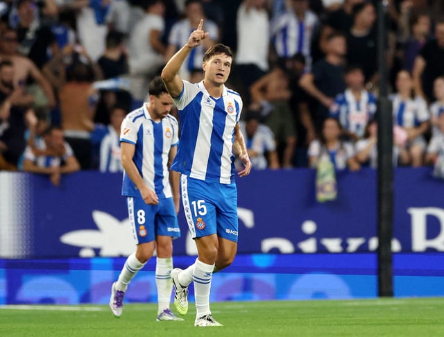 Soccer Football - LaLiga - Espanyol v Atletico Madrid - RCDE Stadium, Cornella de Llobregat, Spain - August 17, 2025 Espanyol's Miguel Rubio celebrates scoring their first goal REUTERS/Bruna Casas