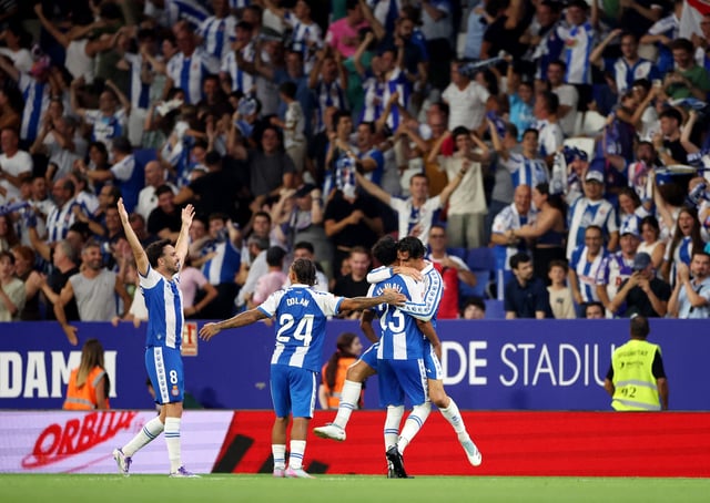 Soccer Football - LaLiga - Espanyol v Atletico Madrid - RCDE Stadium, Cornella de Llobregat, Spain - August 17, 2025 Espanyol's Pere Milla celebrates scoring their second goal with Omar El Hilali, Tyrhys Dolan and Edu Exposito REUTERS/Bruna Casas