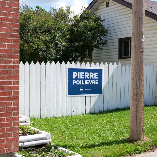 A Pierre Poilievre campaign sign on a supporter's fence in Camrose, Alta., Aug. 11.