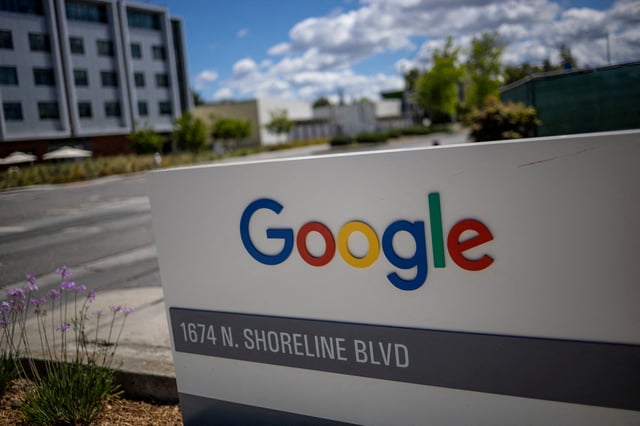A Google logo is seen at a company research facility in Mountain View, California, U.S., May 13, 2025. REUTERS/Carlos Barria/File Photo