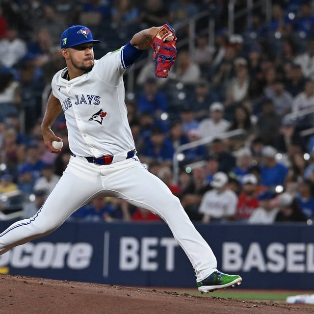 Toronto Blue Jays starting pitcher Jose Berrios (17) throws to a Texas Rangers batter in first inning MLB baseball action in Toronto on Sunday, Aug. 17, 2025. THE CANADIAN PRESS/Jon Blacker