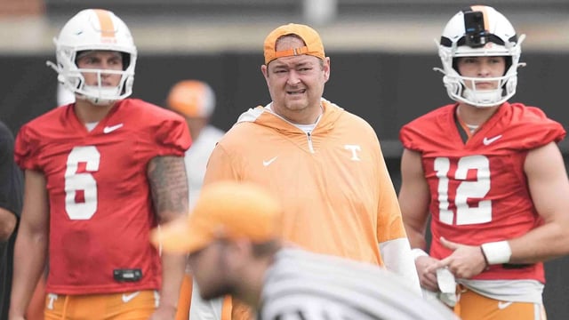 Tennessee quarterback Joey Aguilar (6) Tennessee head coach Josh Heupel and Tennessee quarterback Jake Merklinger (12) during Tennessee football preseason practice, in Knoxville, Tennessee, July 31, 2025. Caitie McMekin/News Sentinel / USA TODAY NETWORK via Imagn Images