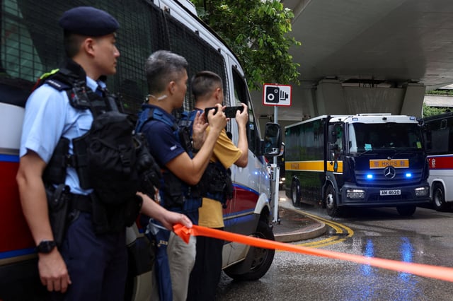 A prison van believed to be carrying Jimmy Lai arrives at the West Kowloon Magistrates’ Courts building for the closing submissions in the national security collusion trial of Jimmy Lai, founder of the now-defunct pro-democracy newspaper Apple Daily, in Hong Kong, China, August 18, 2025. REUTERS/Tyrone Siu     TPX IMAGES OF THE DAY