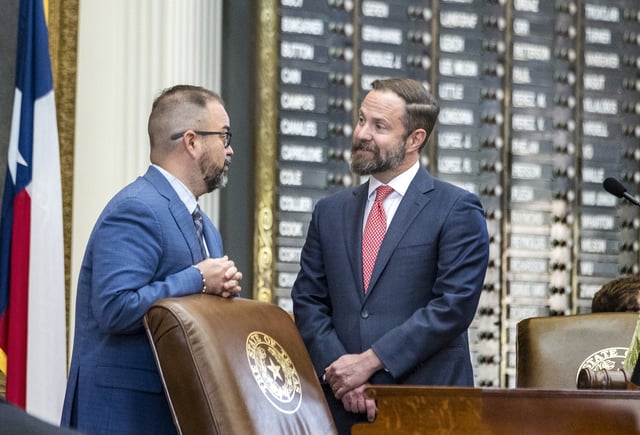 CORRECTS LAST NAME Texas House Speaker Dustin Burrows, R-Lubbock, right, and House Rep. Joe Moody, D-El Paso, meet at the speaker's diocese after a second special session began Friday, Aug. 15, 2025, in Austin, Texas. (AP Photo/Rodolfo Gonzalez)
