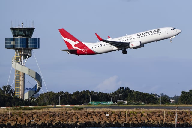 FILE - A Qantas Boeing 737 passenger plane takes off from Sydney Airport, Australia, Sept. 5, 2022. (AP Photo/Mark Baker, File)