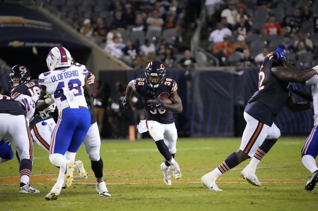 Aug 17, 2025; Chicago, Illinois, USA; Chicago Bears running back Brittain Brown (38) runs against the Buffalo Bills during the second half at Soldier Field. Mandatory Credit: David Banks-Imagn Images