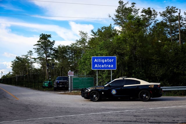 A Florida State Trooper vehicle enters "Alligator Alcatraz" ICE detention center in the Dade-Collier Training and Transition Airport in Ochopee, Florida, U.S. August 3, 2025. REUTERS/Eva Marie Uzcategui