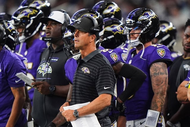 Baltimore Ravens head coach John Harbaugh watches play in the first half of a preseason NFL football game against the Dallas Cowboys Saturday, Aug. 16, 2025, in Arlington, Texas. (AP Photo/LM Otero)